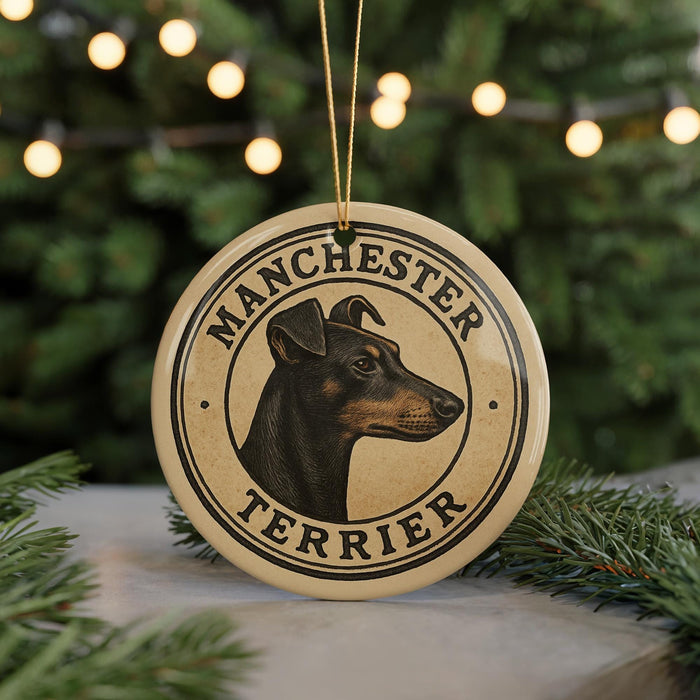 A circular ornament featuring a close-up of a Manchester Terrier dog's head, with the text "MANCHESTER TERRIER" prominently displayed.
