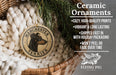 Ceramic ornaments, specifically a Manchester Terrier ornament, are displayed in a wicker basket. The ornament features a black and brown dog's head and the text "MANCHESTER TERRIER". The image also includes text describing the ornament's features, such as being cozy, high-quality, vibrant, and long-lasting, and being shipped fast in holiday packaging. The image also mentions that the ornament won't peel or fade over time.