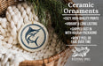 Ceramic ornaments, featuring a blue and white design of a swordfish, are displayed in a woven basket.