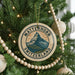 A Christmas tree decorated with ornaments, including a circular ornament with the text "MATTERhorn SWITZERLAND" and a mountain illustration.