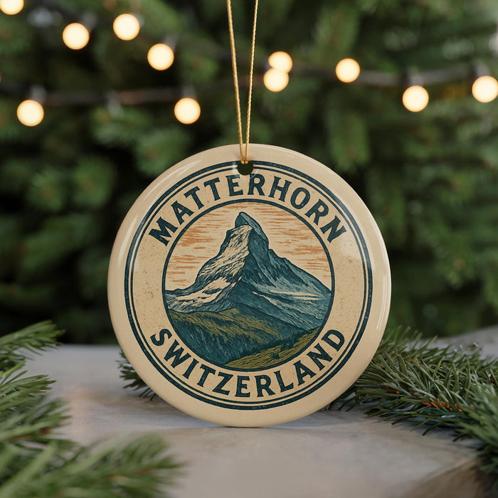 A circular ornament with the text "MATTERHORN SWITZERLAND" and an illustration of a mountain, hanging from a string.