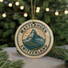 A circular ornament with the text "MATTERHORN SWITZERLAND" and an illustration of a mountain, hanging from a string.