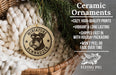 Ceramic ornaments, including a round ornament with a dog image, are displayed in a wicker basket.