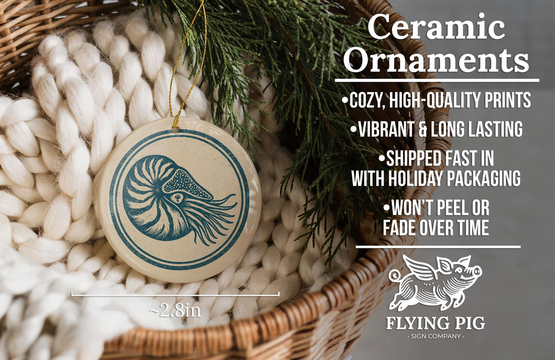 Ceramic ornaments, featuring a nautilus shell design, are displayed in a wicker basket.