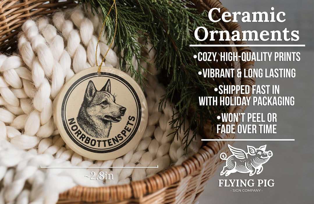 Ceramic ornaments, including a ceramic dog ornament, are displayed in a wicker basket.