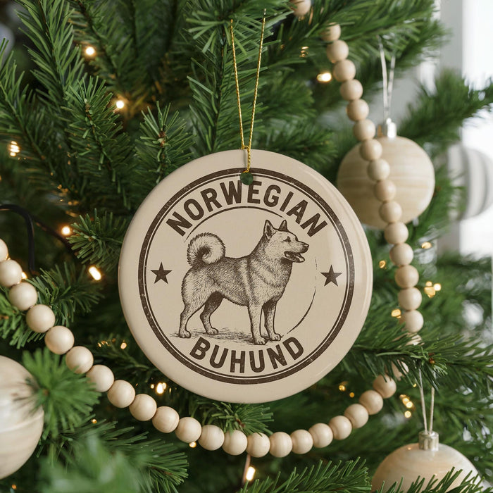 A Christmas tree decorated with ornaments, including a circular ornament with a dog illustration and the text "NORWEGIAN Buhund".