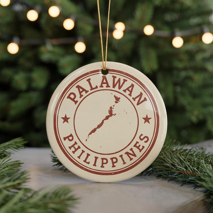 A circular ornament with the text "PALAWAN PHILIPPINES" printed on it, featuring a map of the Philippines.