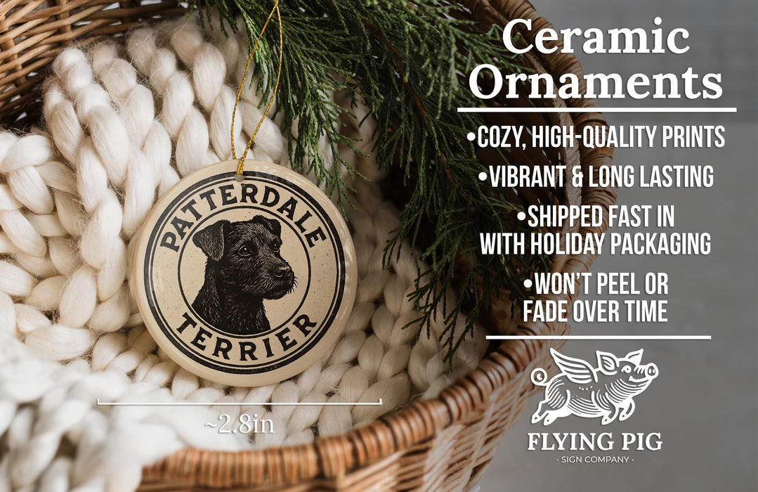 Ceramic ornaments, specifically Patteredale Terrier ornaments, are displayed in a wicker basket.