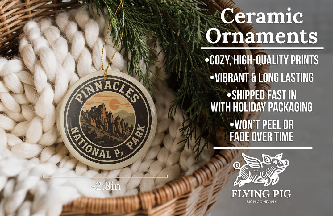 Ceramic ornaments, featuring a Pinnacles National Park logo, are displayed in a woven basket.