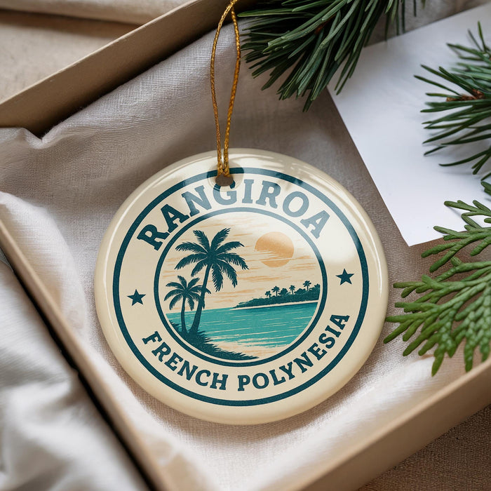 A circular ornament with the text "RANGIRO A FRENCH POLYNESIA" and a palm tree design, hanging from a string.