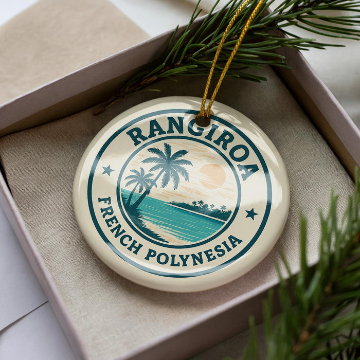 A circular ornament with the text "RANGIRO A FRENCH POLYNESIA" printed on it, surrounded by a decorative border and a palm tree design.