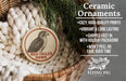 Ceramic ornaments, including a ceramic ornament with a red-tailed hawk design, are displayed in a wicker basket.