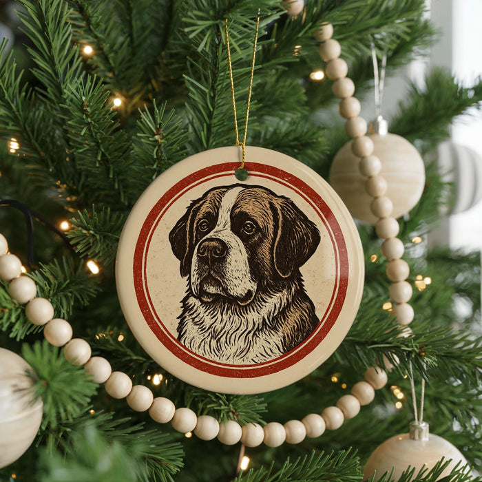 A Christmas tree decorated with ornaments, including a circular ornament featuring a dog's face.