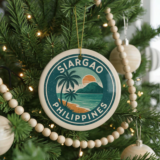 A round ornament on a Christmas tree with the text "SIARGAO PHILIPPINES" and a tropical beach scene.