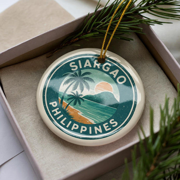 A round ornament with a tropical beach scene and palm trees, featuring the text "SIARGAO PHILIPPINES".