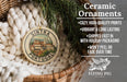 Ceramic ornaments, featuring a round ornament with a picture of a town in Portugal, hanging from a wicker basket.