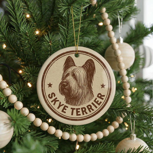 A Christmas tree decorated with ornaments, including a circular ornament with a picture of a Skye Terrier dog and the text "SKYE TERRIER".