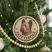 A Christmas tree decorated with ornaments, including a circular ornament with a picture of a Skye Terrier dog and the text "SKYE TERRIER".