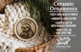 Ceramic ornaments featuring a sloth, a type of primate, are displayed in a basket with a pine branch.