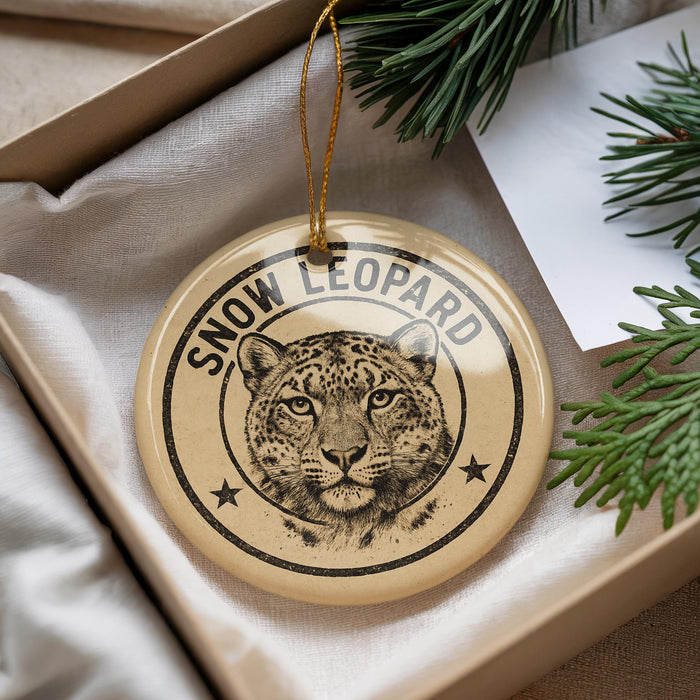A decorative ornament featuring a snow leopard image, with the text "SNOW LEOPARD" prominently displayed.