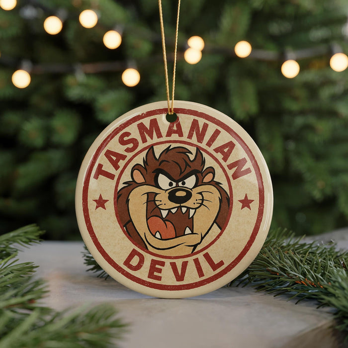 A circular ornament featuring the Tasmanian Devil character from the Looney Tunes franchise, with the text "TASMANIAN DEVIL" prominently displayed.
