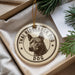 A circular ornament with a dog image and the text "THAI RIDGEBACK DOG" printed on it, hanging from a string.