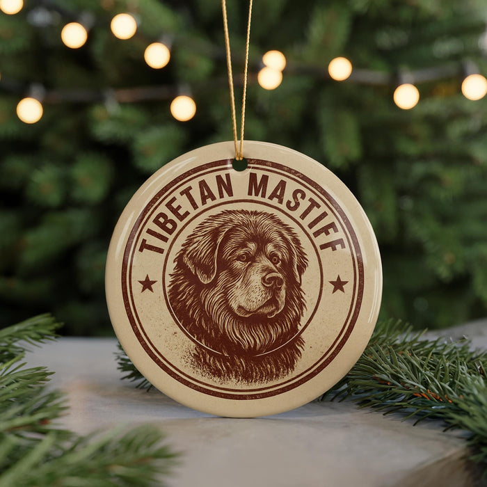 A circular ornament featuring a Tibetan Mastiff dog's head, with the text "TIBETAN MASTIFF" around the edge.