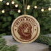 A circular ornament featuring a Tibetan Mastiff dog's head, with the text "TIBETAN MASTIFF" around the edge.