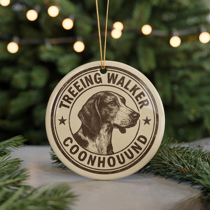 A circular ornament featuring a beagle dog's head, with the text "TREEEING WALKER COONHOUD" around the edge.
