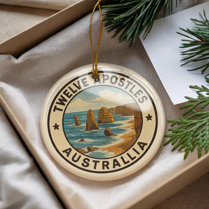 A decorative ornament with the text "TWELVE APOSTLES AUSTRALIA" and an illustration of the Twelve Apostles rock formation, which is a famous landmark in Australia.
