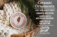 Ceramic ornaments, featuring a white ceramic ornament with a red and white design, hanging from a wicker basket.