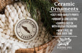 Ceramic ornaments, including a Vancouver Island Canada ornament, are displayed in a woven basket.