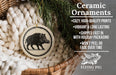 Ceramic ornaments, featuring a black and white illustration of a boar, are displayed in a woven basket.