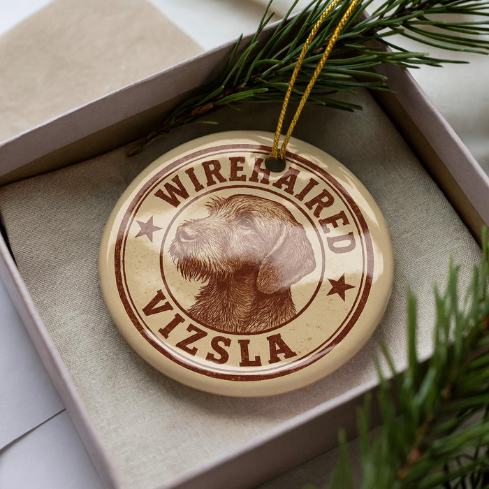 A circular ornament with the text "WIREHAIRED VIZSLA" printed on it, surrounded by a decorative border.