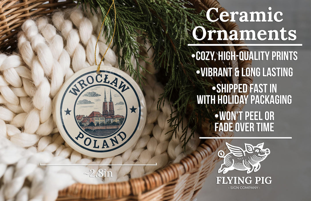Ceramic ornaments, featuring a Wrocław, Poland ornament with a castle and river, displayed in a wicker basket.
