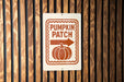 A sign on a wooden wall that reads "PUMPKIN PATCH" with an arrow pointing to the right.