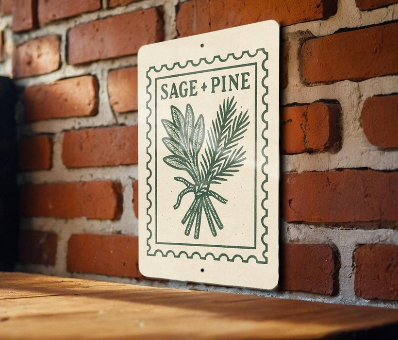 a sign with the text "SAGE + PINE" and an illustration of a plant, mounted on a brick wall.
