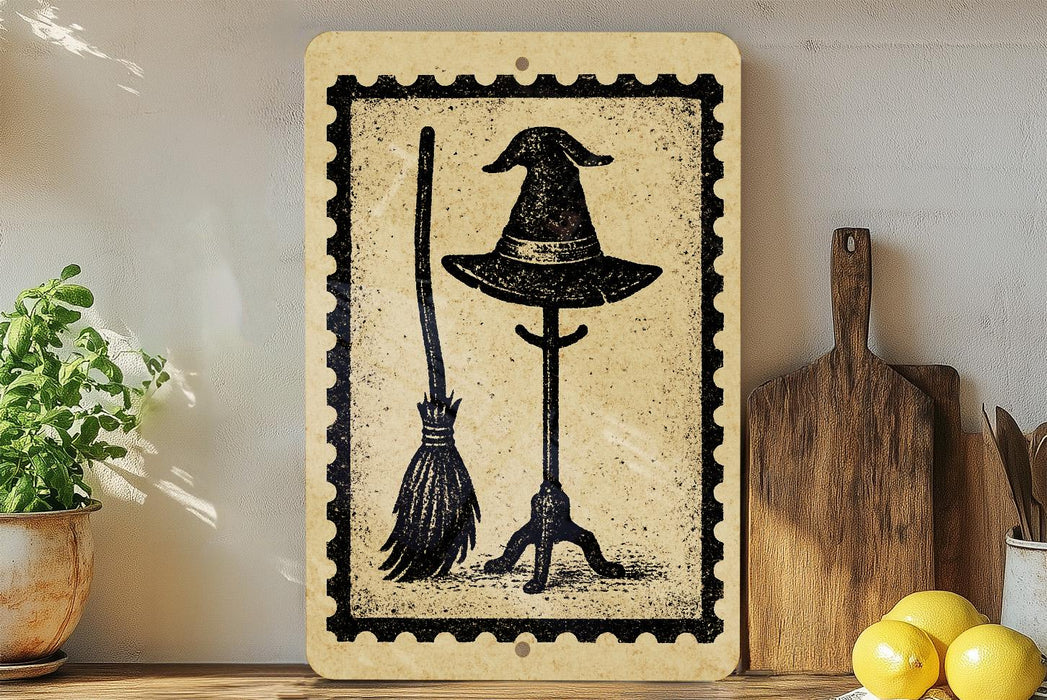 a witch's hat and a broomstick on a shelf, with a wooden cutting board and lemons nearby.