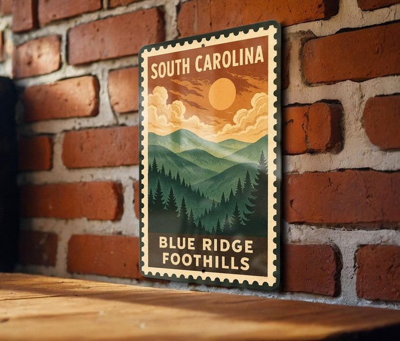 A vintage-style metal sign with the text "SOUTH CAROLINA" and "BLUE RIDGE FOOTHILLS" is displayed on a brick wall.