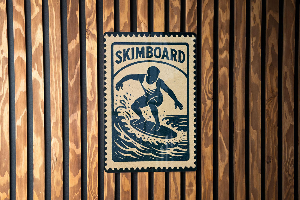 A sign with the word "SKIMBOARD" and an illustration of a surfer riding a wave.