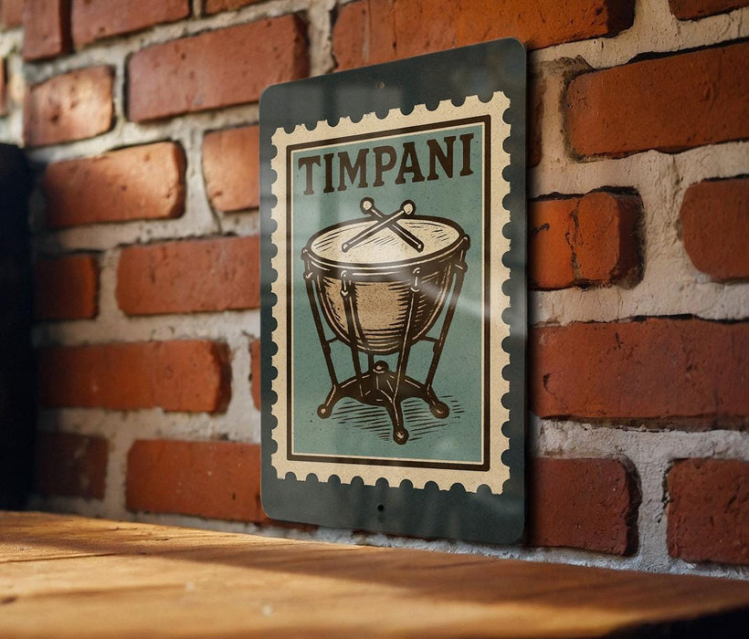 A metal sign with a stamp-like design hangs on a brick wall, featuring an illustration of a drum or cymbal.