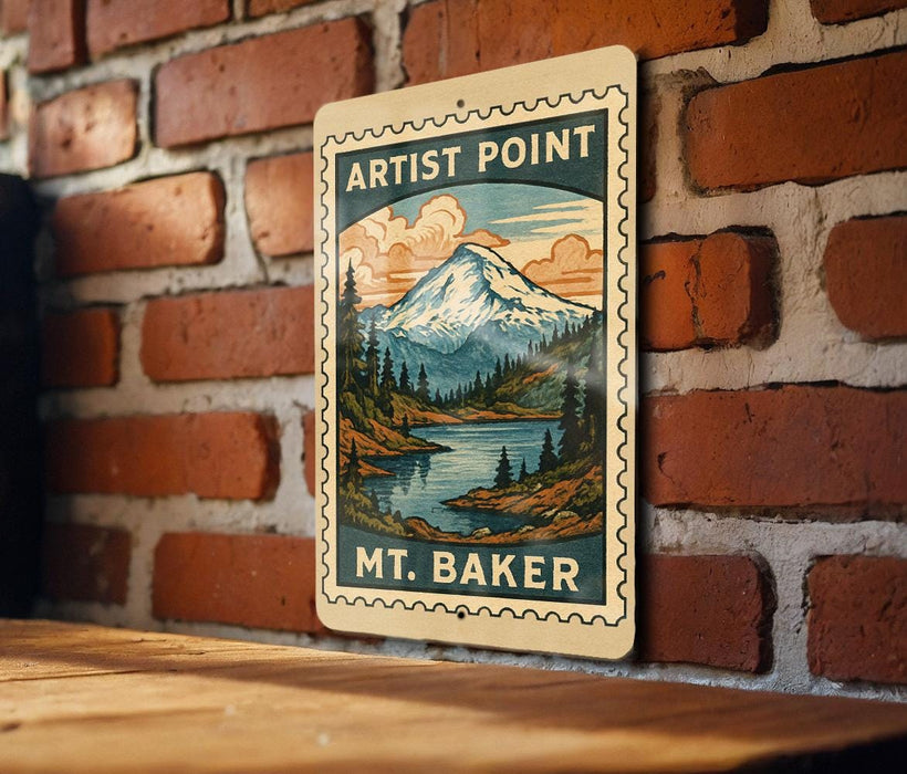A vintage-style metal sign with a mountain landscape and a river, mounted on a brick wall.