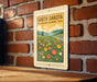 A sign for the South Dakota Wildflower Meadows Trail is displayed on a brick wall.