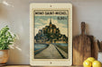 A vintage-style postage stamp depicting the Mont-Saint-Michel castle in France, with a wooden board and a potted plant in the foreground.