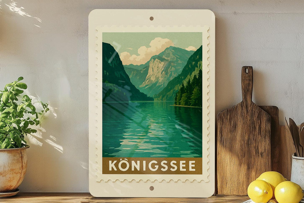 a framed poster of a scenic mountain landscape with a lake, surrounded by potted plants and kitchen utensils.