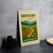 A sign for the Kentucky Wildflower Meadows Trail, featuring a scenic illustration of a meadow with flowers and a winding path.