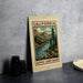 A framed illustration of a scenic landscape with mountains, trees, and a river, depicting the Alpine Lakes basin in California.