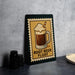 A framed illustration of a root beer float on a wall, accompanied by the text "ROOT BEER FLOAT" in a vintage style.