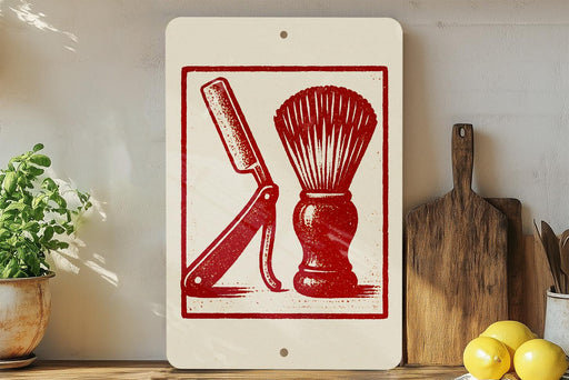 a sign with a red and white design depicting a shaving razor and a shaving brush, placed on a wooden surface next to a wooden cutting board and a potted plant.