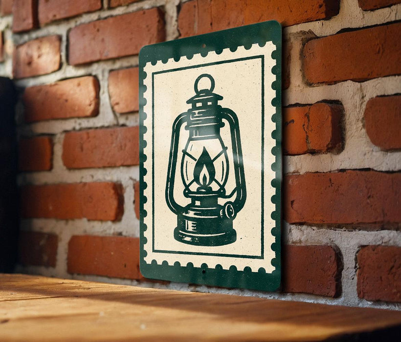 A green and white sign featuring a lantern is mounted on a brick wall.